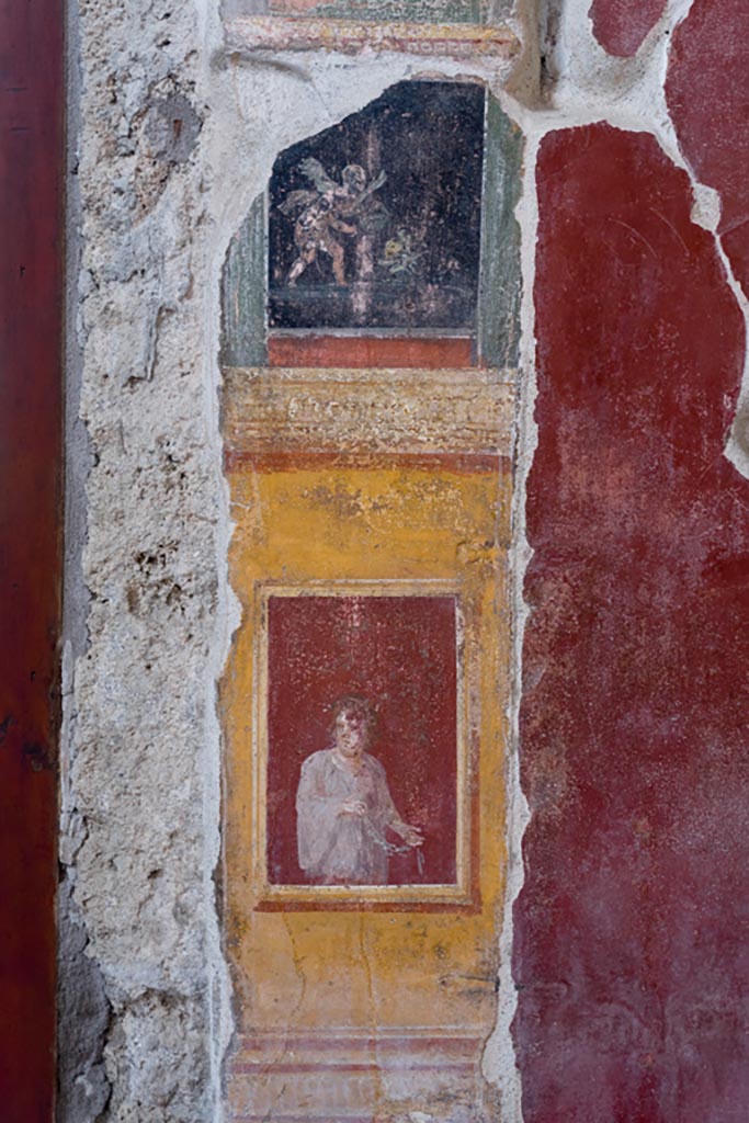 VI.15.1 Pompeii. March 2023.
Painted panel on west wall between atrium and north ala. Photo courtesy of Johannes Eber.
