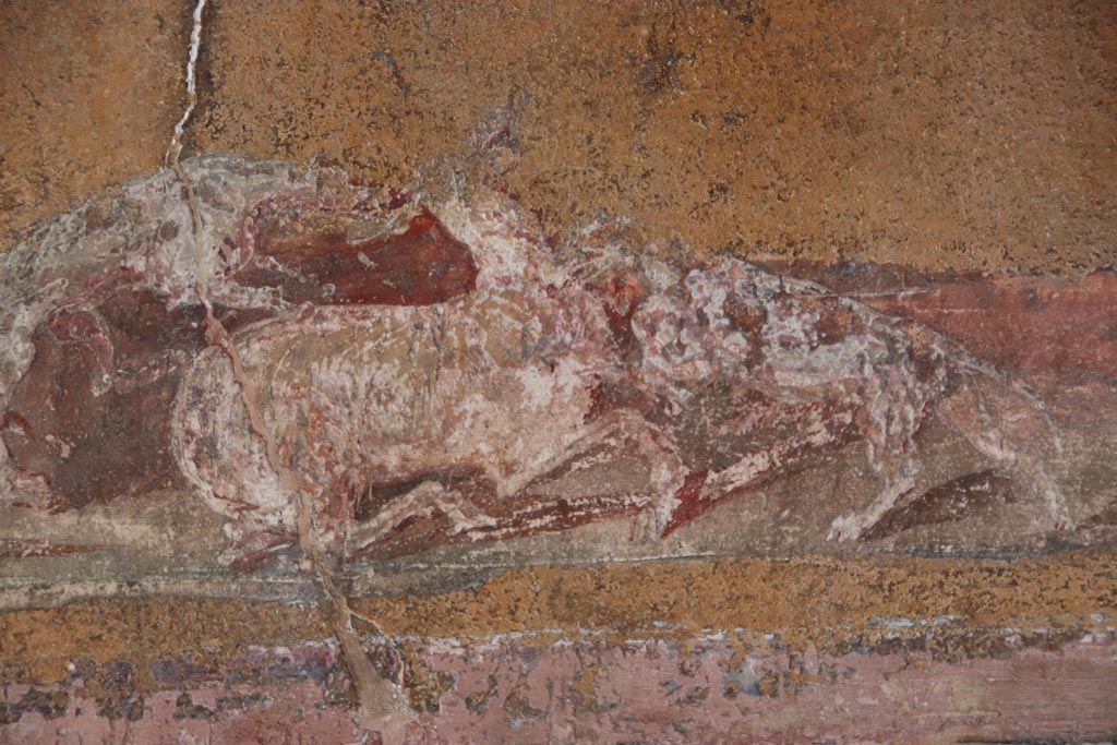 VI.15.1 Pompeii. October 2023. 
North wall of atrium, detail from lower panel below above three photos, above site of strongbox. Photo courtesy of Klaus Heese.
