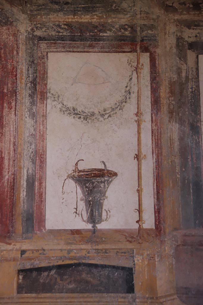 VI.15.1 Pompeii. October 2023.
Detail from upper south wall of oecus at east end. Photo courtesy of Klaus Heese.