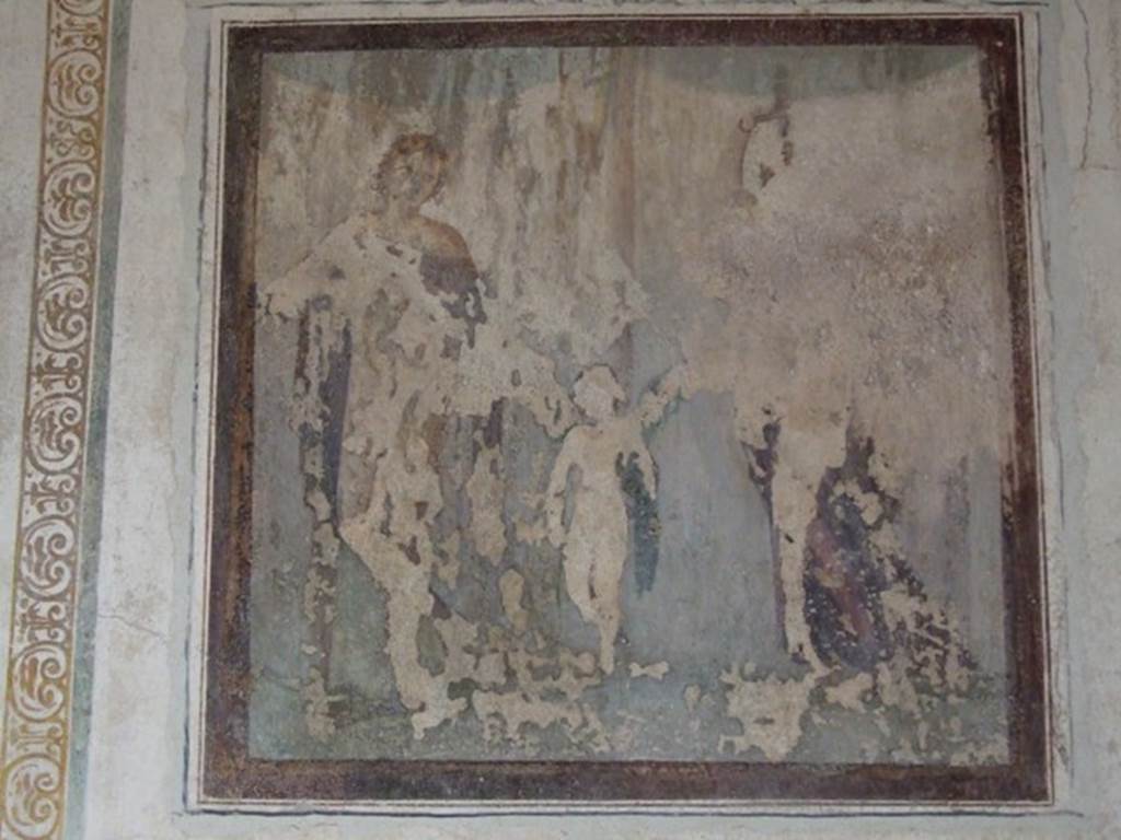 VI.15.8 Pompeii. December 2007. Remains of fresco of Paris, Eros and Helen on east wall of Oecus.
