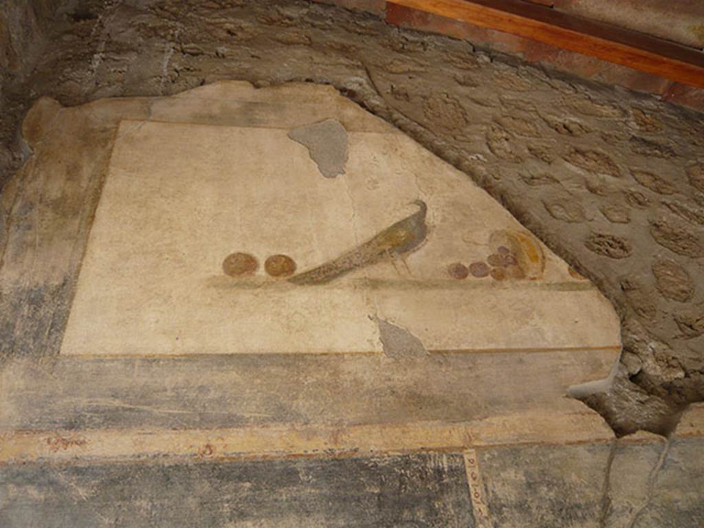 VI.16.7 Pompeii. June 2013. Entrance �A� upper north wall.
Painting of still life with peacock and fruit, after recent restoration. 
Photo courtesy of Buzz Ferebee.
