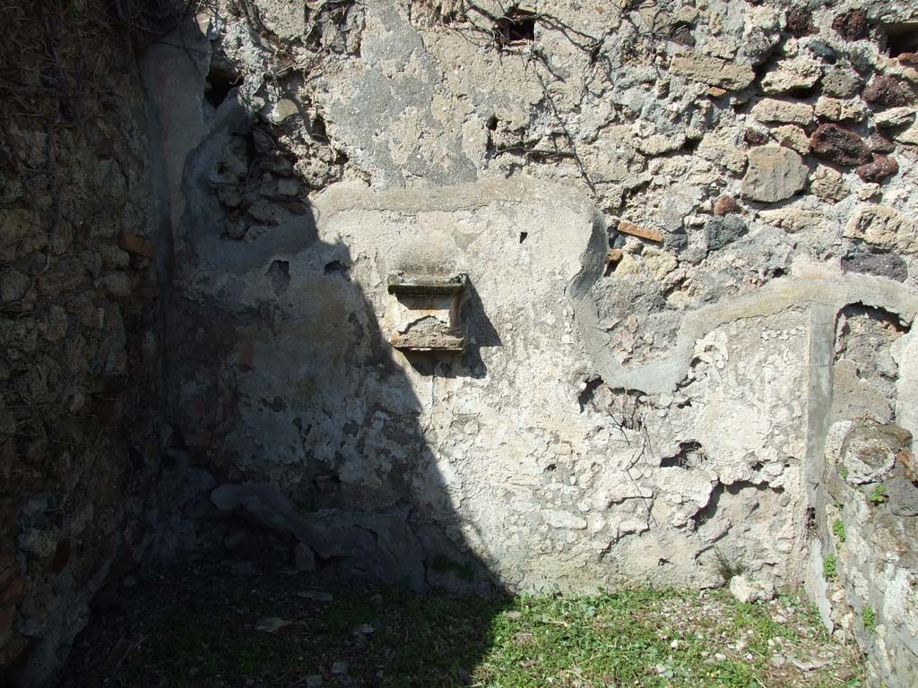 VI.16.12 Pompeii. March 2009. First rear room. North wall, west end of wall with lararium.