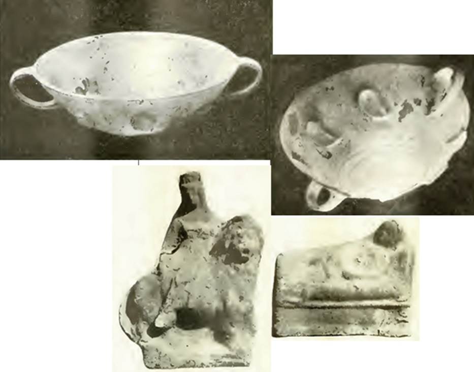 VI.16.28 Pompeii. 1908. Room F, tablinum, some of the finds from the tablinum. A pair of glass cups, mould-blown, with formal decoration in relief and each with two handles.
A terracotta statuette of Venus sitting on a lion. A terracotta statuette of a Lar lying on a bed. Now in Naples Archaeological Museum.  One glass cup is Inventory number 133273.
See Notizie degli Scavi di Antichit�, 1908, p. 276-8, figs 4, 4a, 5 and 6. See Ward Perkins, J. and Claridge A., 1976. Pompeii AD 79.  London: Westerham. (No. 116)
