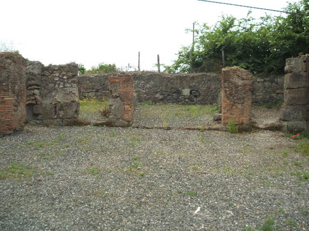 VI.17.1 Pompeii. May 2005. Looking west from entrance doorway, towards rooms on west side.