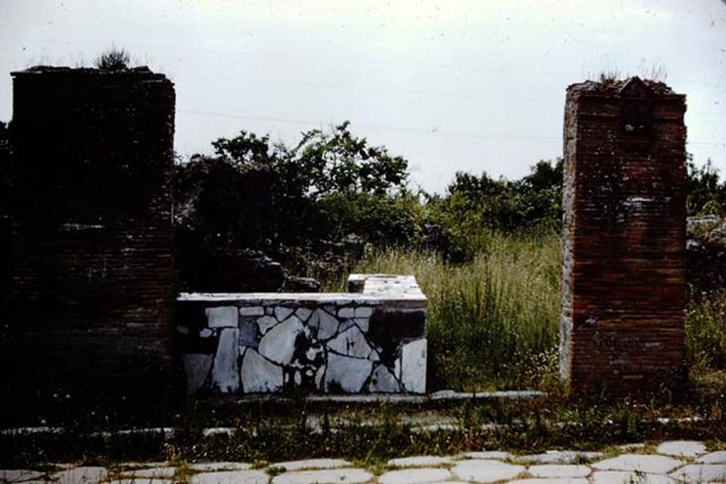 VI.17.4 Pompeii. 1961. Looking west towards two sided marble counter.  Photo by Stanley A. Jashemski.
Source: The Wilhelmina and Stanley A. Jashemski archive in the University of Maryland Library, Special Collections (See collection page) and made available under the Creative Commons Attribution-Non Commercial License v.4. See Licence and use details.
J61f0612
