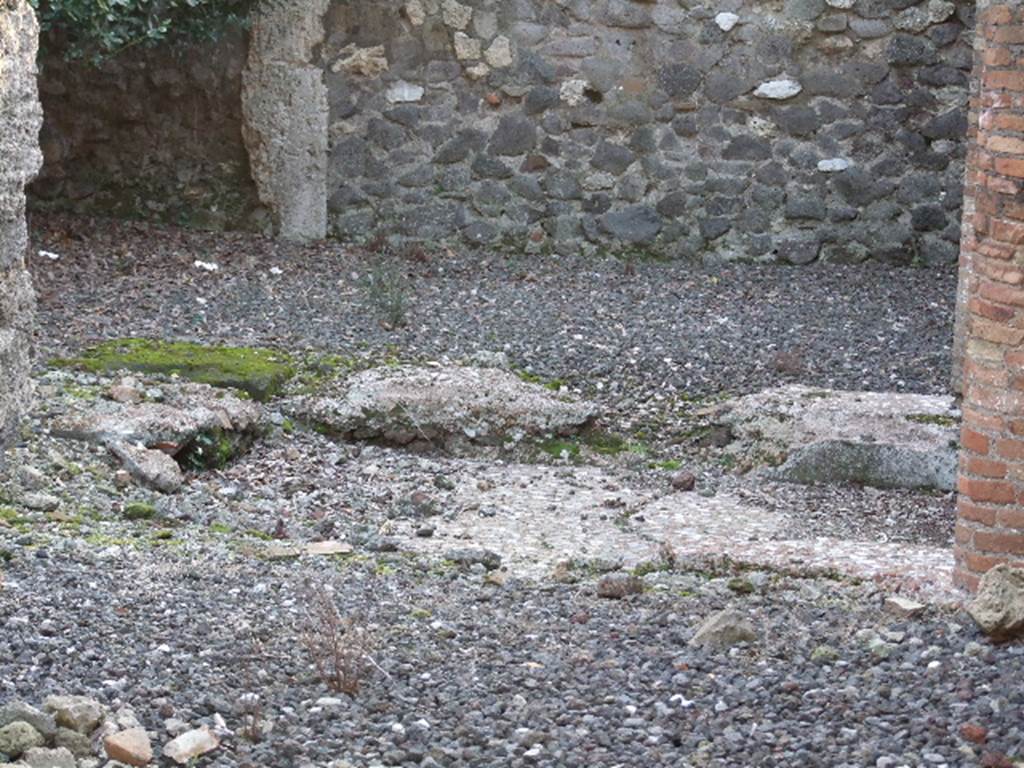 VI.17.5 Pompeii. December 2006. Looking west to impluvium, built against north wall of atrium. 
