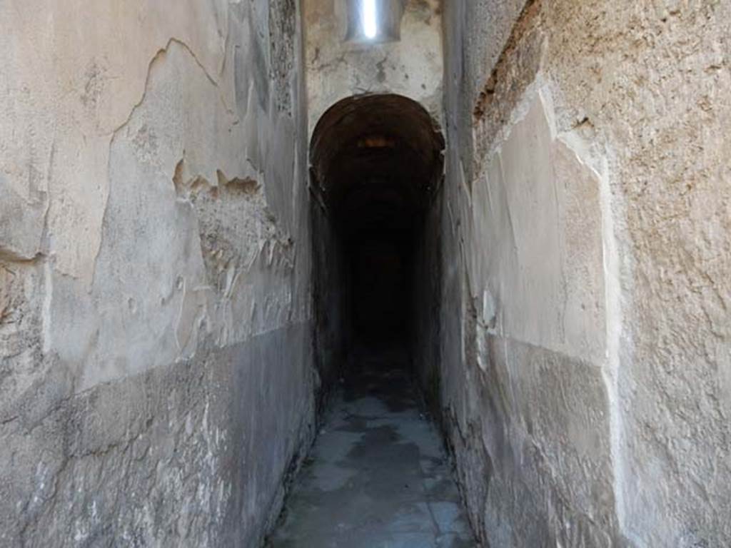 VII.1.48 Pompeii. May 2015. Looking east along corridor K. 
This leads to apodyterium (changing room) 11 of the women�s baths.
Photo courtesy of Buzz Ferebee.
