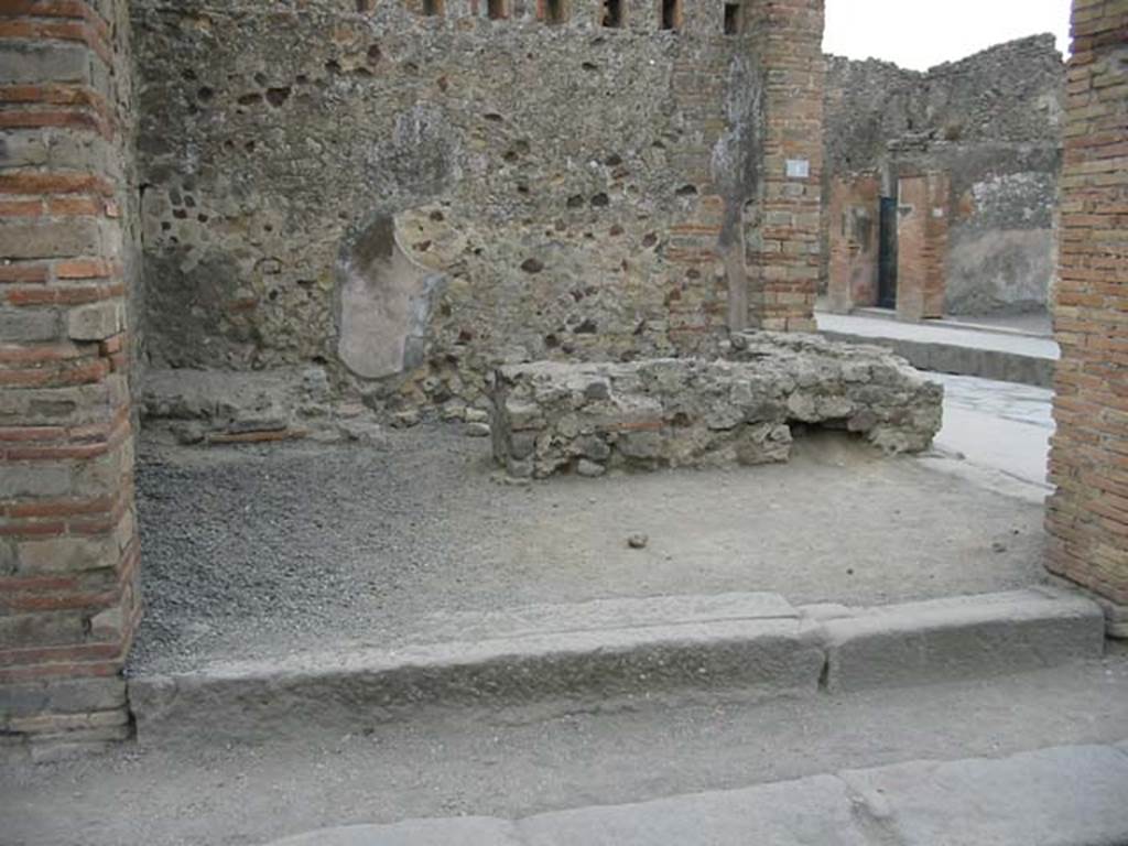 VII.1.62 Pompeii. May 2003. Entrance on corner of Vicolo del Lupanare, looking south-east towards Via dell�Abbondanza, on right. Photo courtesy of Nicolas Monteix.
