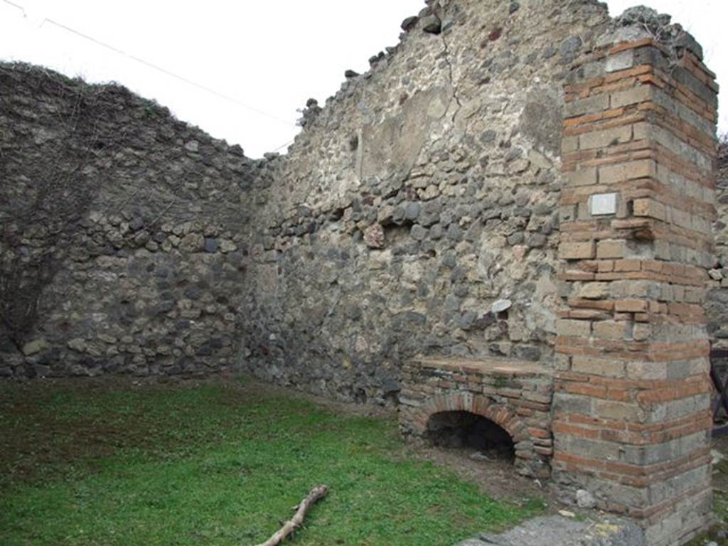 VII.2.2 Pompeii. December 2007. North wall with hearth.