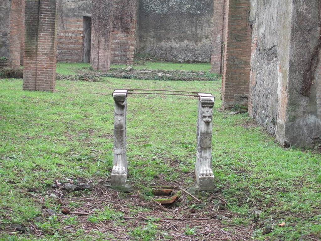 VII.2.18 Pompeii.  December 2005.  Room 1. Atrium.  Table legs.