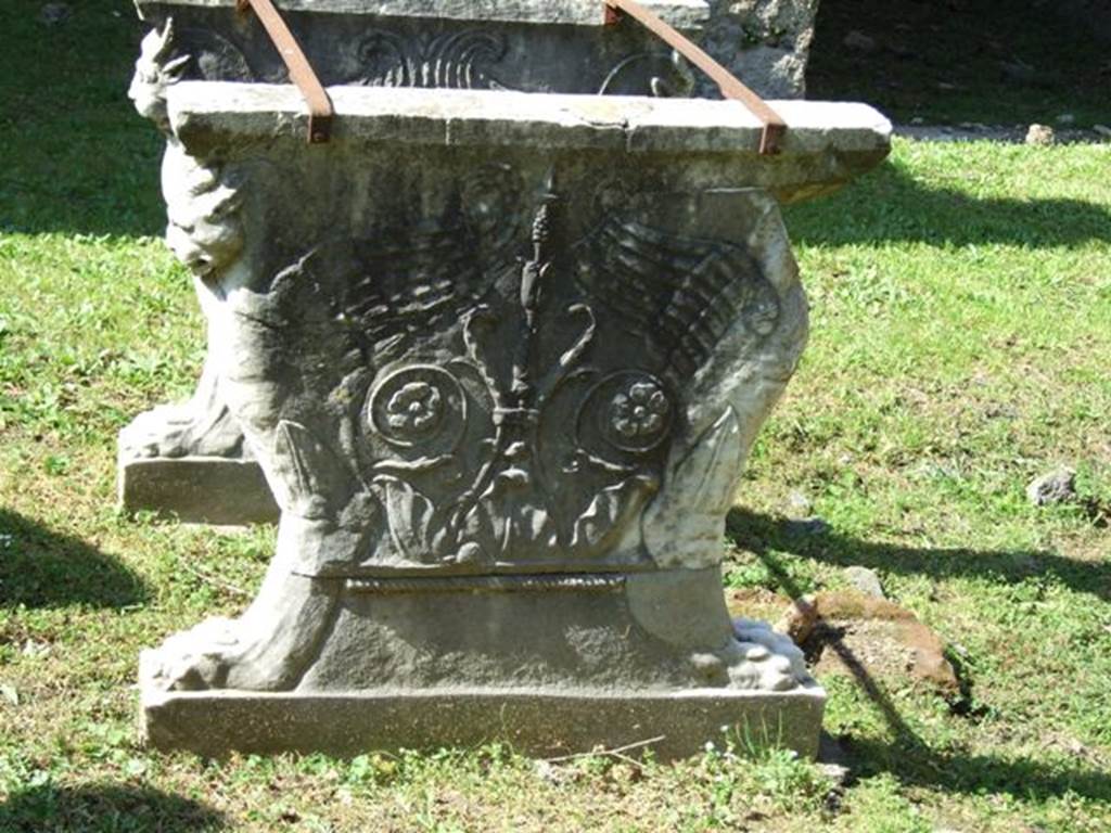 VII.2.18 Pompeii. March 2009. Room 1, atrium. East side of marble table legs of winged panthers.  
