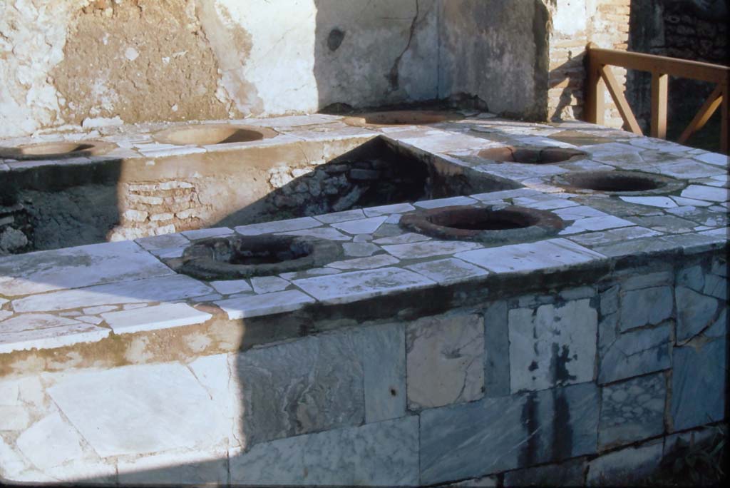VII.2.32 Pompeii. 4th December 1971. Looking east across marble clad counter.
Photo courtesy of Rick Bauer, from Dr.George Fay�s slides collection.

