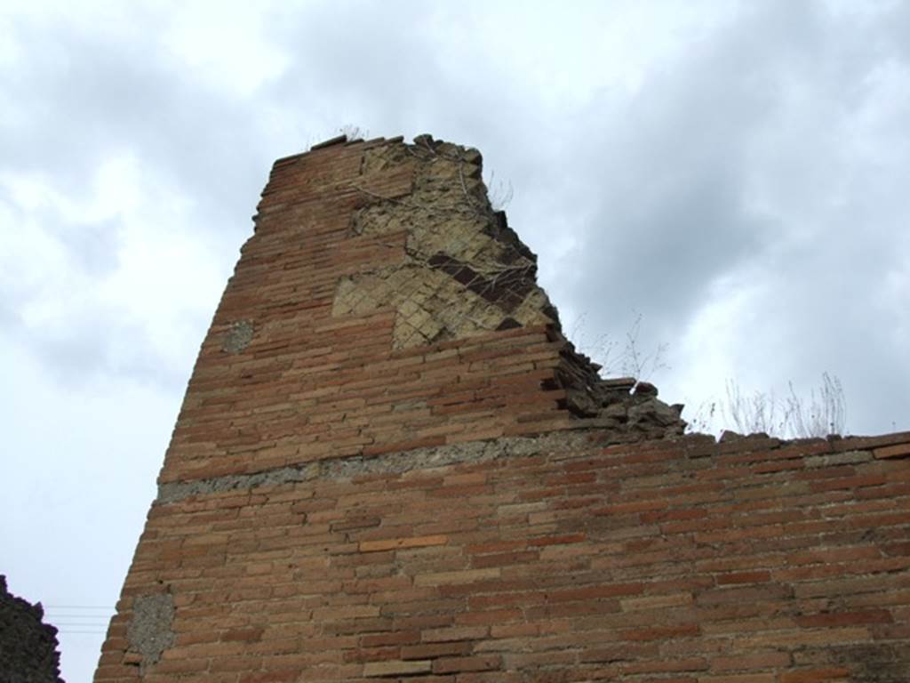 VII.2.34 Pompeii.  December 2007.  Wall to left of entrance on Via degli Augustali.