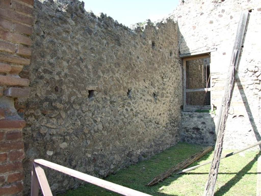 VII.2.42 Pompeii. March 2009.  West wall of shop.