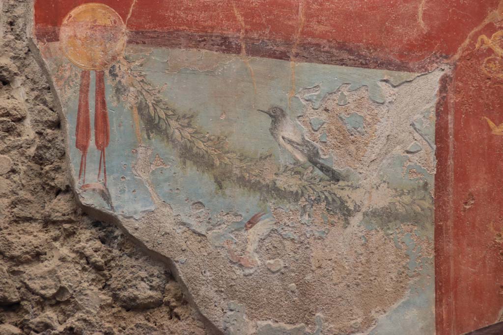 VII.2.45 Pompeii. September 2017. Detail of painted wall from west side of north wall behind fountain.
Photo courtesy of Klaus Heese.