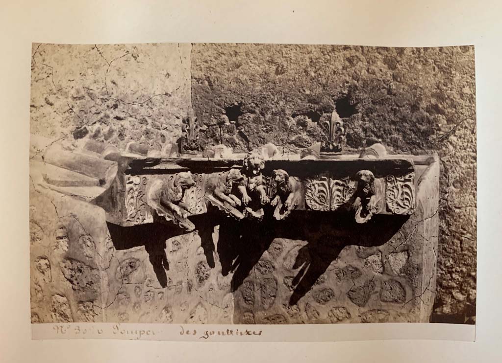 VII.4.15 Pompeii. Album by M. Amodio, c.1880, entitled �Pompei, destroyed on 23 November 79, discovered in 1748�.
Grondaie, or rainwater spouts. Photo courtesy of Rick Bauer.
