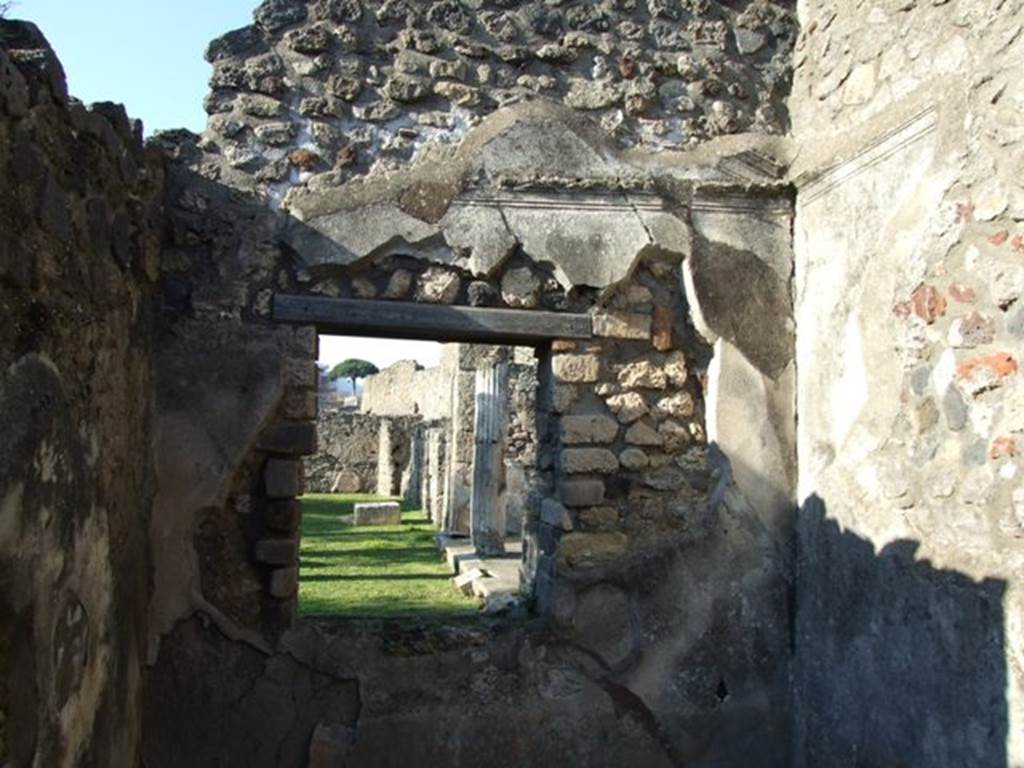 VII.4.31 Pompeii.  March 2009.  Room 35.  North wall with window overlooking East Portico of North Peristyle.