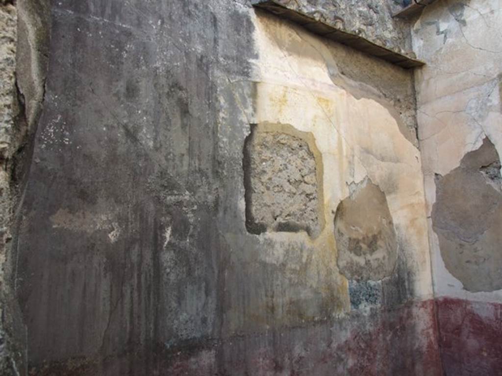 VII.4.31 Pompeii.  March 2009.  Room 22.  West wall. The central wall painting was a Mythological Landscape showing Polyphemus, looking out to sea at his beloved Galatea.  Painting now in Naples Museum.