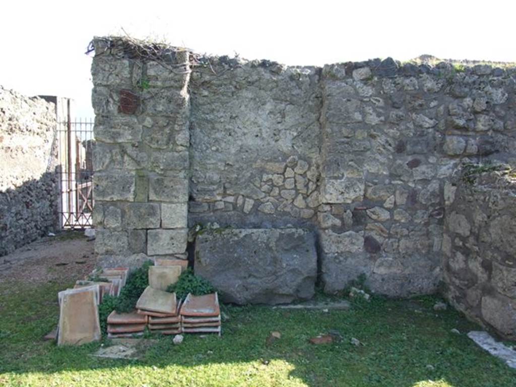 VII.4.31/51 Pompeii. March 2009. Room 2, south-west corner of atrium. 
The money chest base is upright against the wall, standing with its underside out.
Our thanks to Espen B Andersson for identifying this for us.

