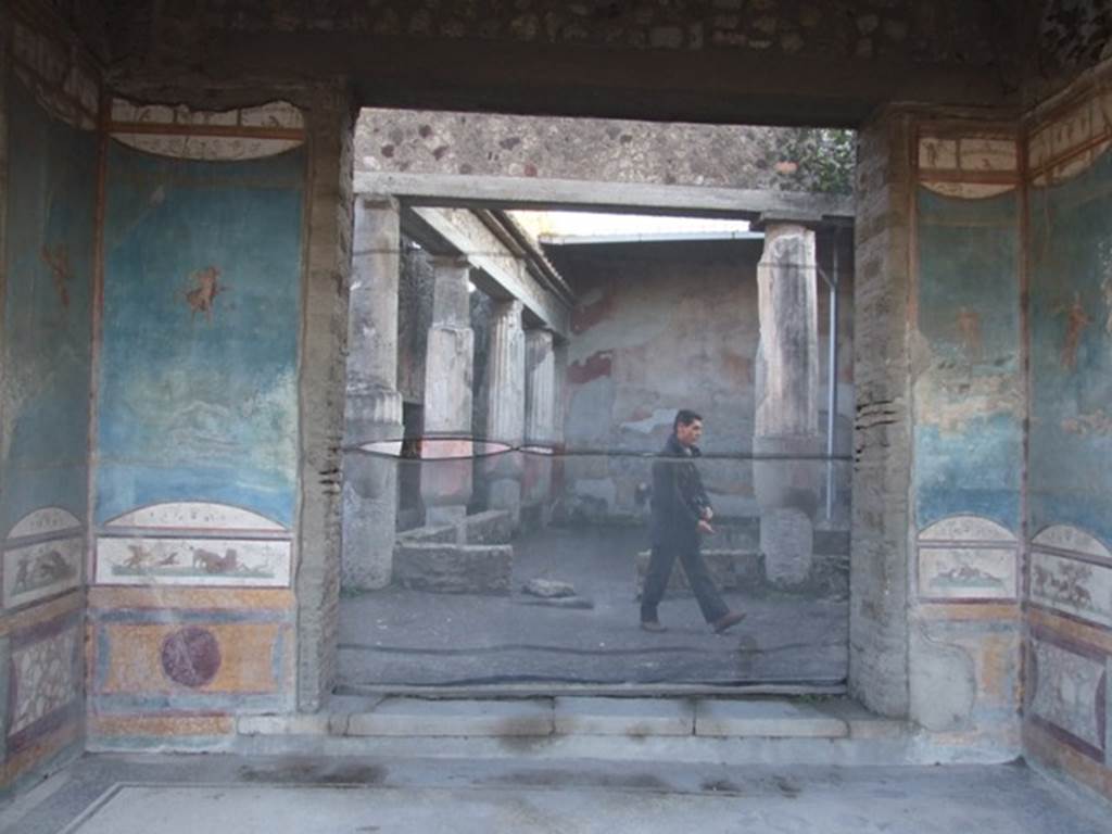 VII.4.48 Pompeii.  December 2007. Room 11. Tablinum. South wall with doorway to peristyle.