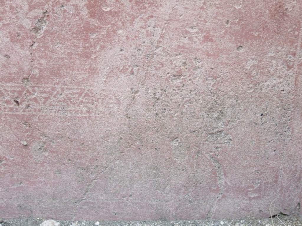 VII.4.48 Pompeii. March 2009. Room 2. Atrium. North wall. Painted plaster with faded decoration.