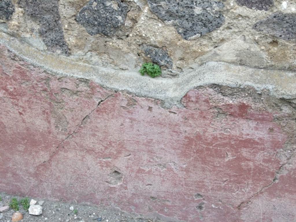 VII.4.48 Pompeii. March 2009. Room 2, north wall of atrium. Coin imprints in the plaster.
See Descoeudres, J-P., 1994: Pompeii revisited. Univ. of Sydney, (p.167)