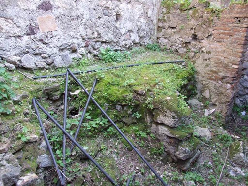 VII.4.56 Pompeii.  March 2009.  Room 10. Kitchen.  Remains of hearth.