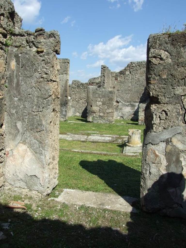VII.4.57. Pompeii.  March 2009.  Room 10.  Cubiculum.  East wall, looking west into atrium.
