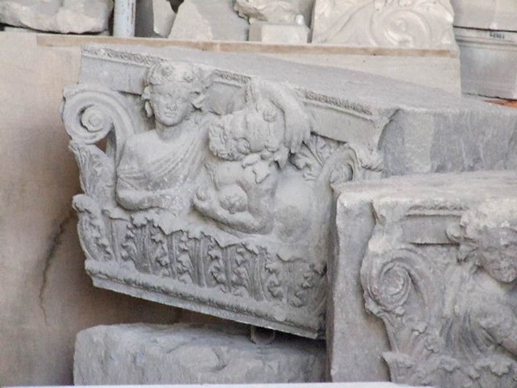 VII.4.57 Pompeii. December 2006, on display in Forum Granaio at VII.7.29.
Drunken satyr and a maenad on a capital. This faced the Via della Fortuna on the top of right-hand side of entrance.


