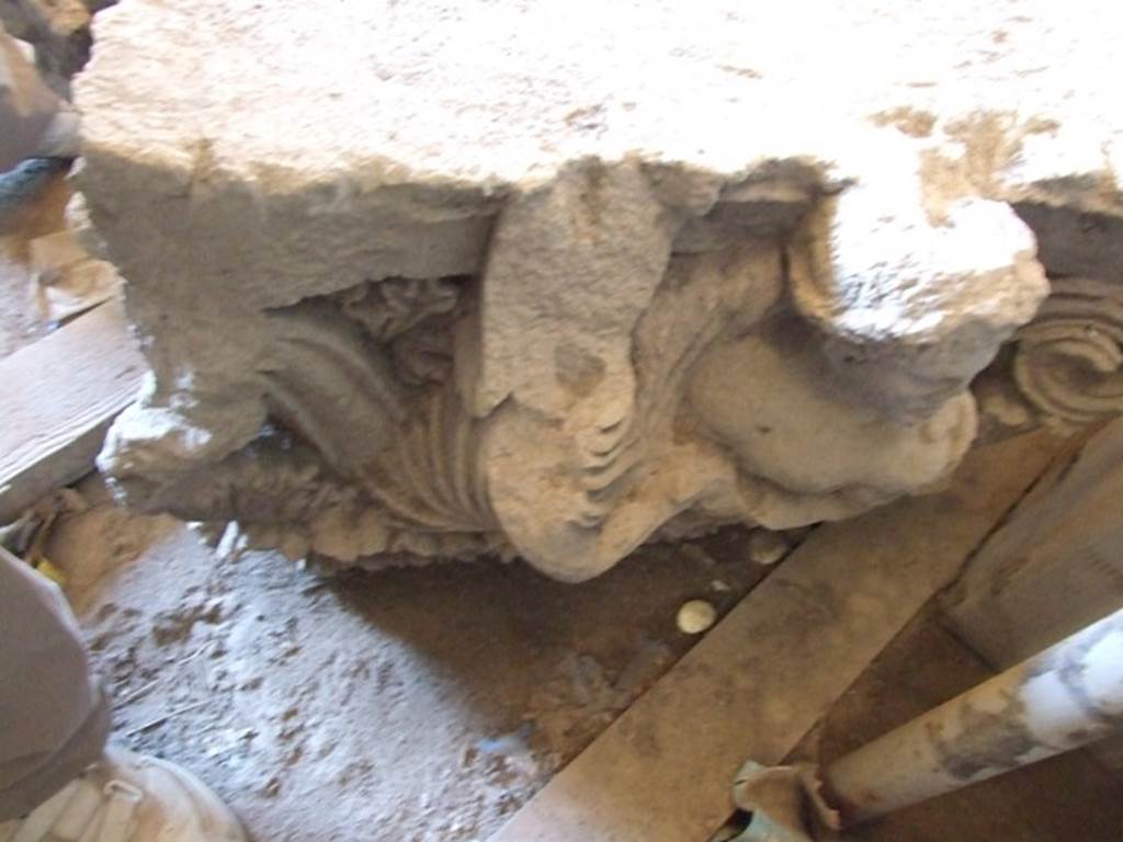 VII.4.57 Pompeii. December 2006, on display in Forum Granaio at VII.7.29. 
Figures of a man and woman on a capital. This faced into the vestibule on the top of left-hand side of entrance.

