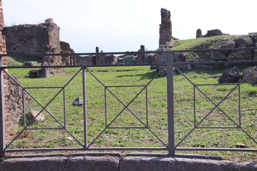 VII.6.6 Pompeii. October 2023. Looking south across sill or threshold of entrance to the site of a shop. Photo courtesy of Klaus Heese.

