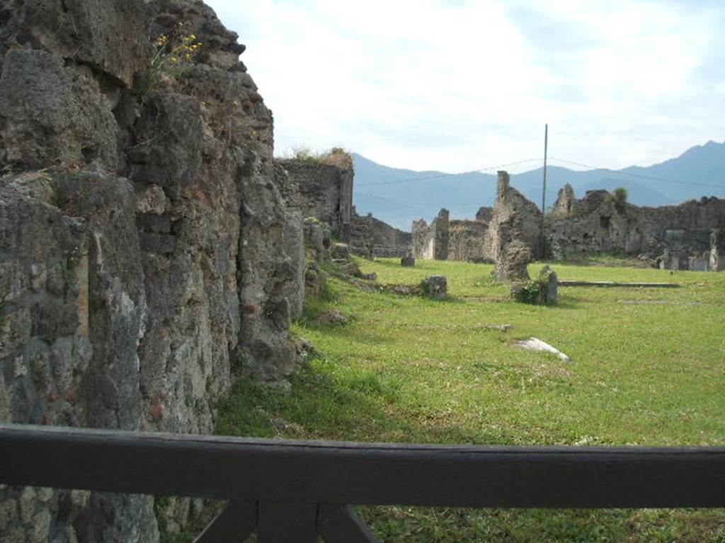 VII.6.9 Pompeii. May 2005. Looking south along site of steps to upper floor, on east side of shop at VII.6.8.