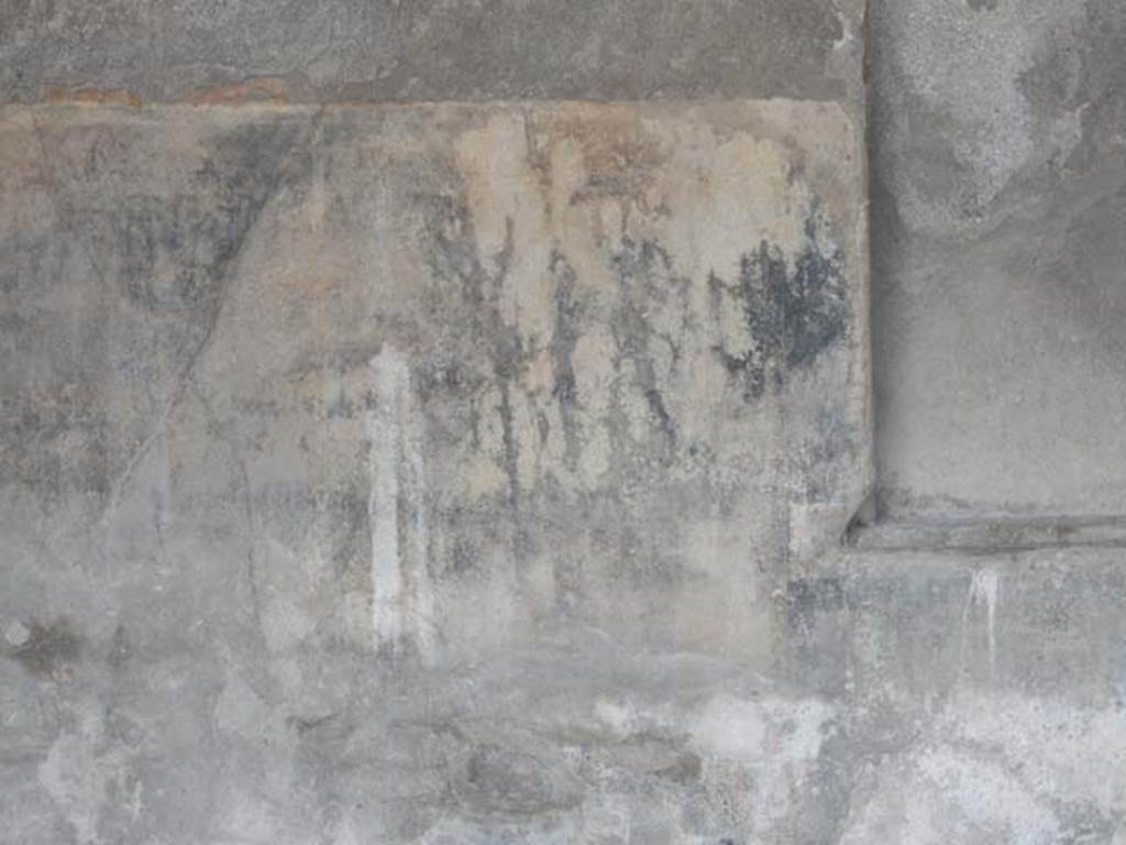 VII.7.5 Pompeii, May 2018. Triclinium (q), north wall at west end with detail of high black painted zoccolo. Photo courtesy of Buzz Ferebee.