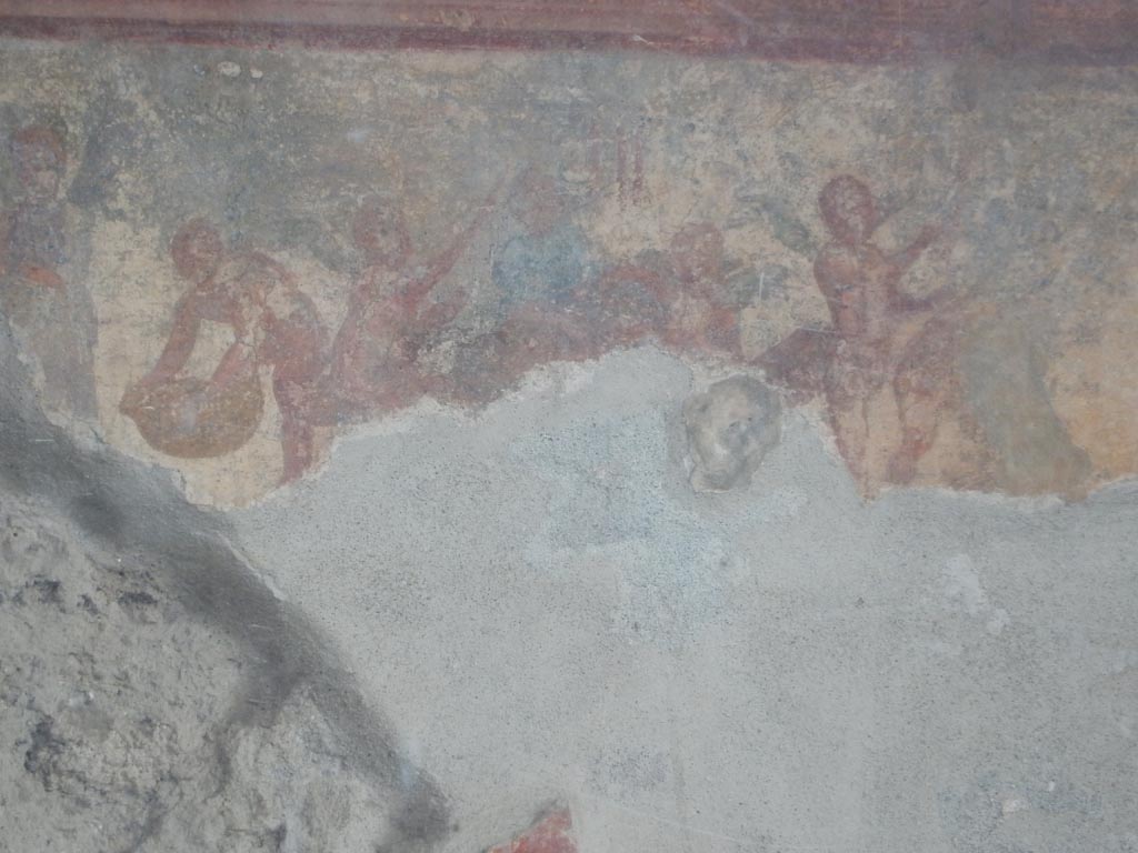 VII.7.5 Pompeii. May 2015.
Oecus (m) north wall east side of peristyle. Detail of wall painting of cupids making flower garlands. Photo courtesy of Buzz Ferebee.