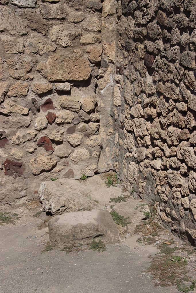 VII.7.6 Pompeii. October 2023. 
North-east corner of shop-room, detail. Photo courtesy of Klaus Heese.
