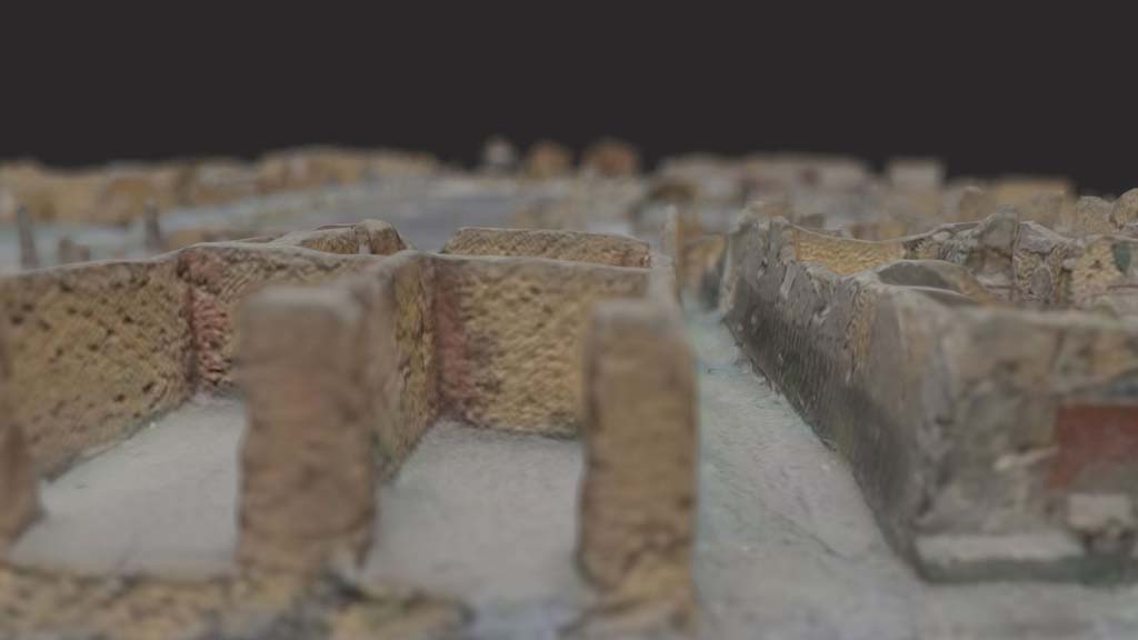 VII.7.23 Pompeii. October 2017. Detail from model in Naples Archaeological Museum.
According to the detail above, the entrance �alley or small vicolo� (on right) would have been decorated with Zebra Stripes. 
Information and Foto from Taylor Lauritsen, ERC Grant 681269 D�COR.
