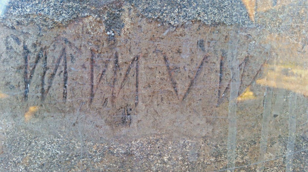 VII.7.32 Pompeii.  December 2019. Detail of part of inscription. Photo courtesy of Giuseppe Ciaramella.