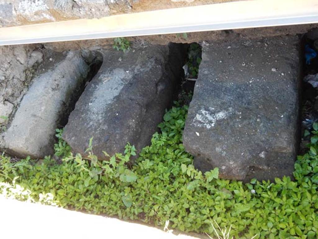 VII.7.32 Pompeii. May 2018. Foundations against west wall of podium. Photo courtesy of Buzz Ferebee.