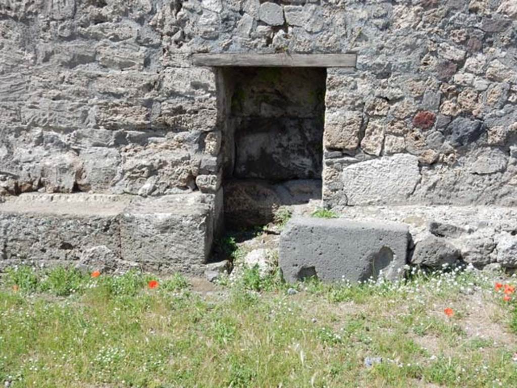 VII.7.32 Pompeii. May 2018. East wall of podium. Photo courtesy of Buzz Ferebee.

