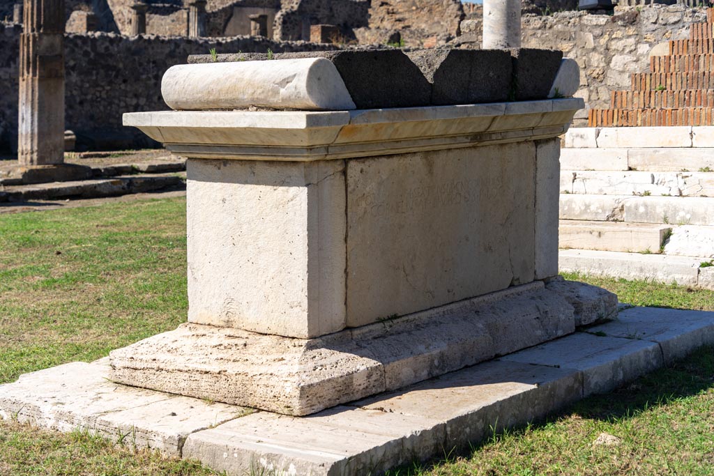 VII.7.32 Pompeii. October 2023. East side of altar, looking north-west across temple. Photo courtesy of Johannes Eber.