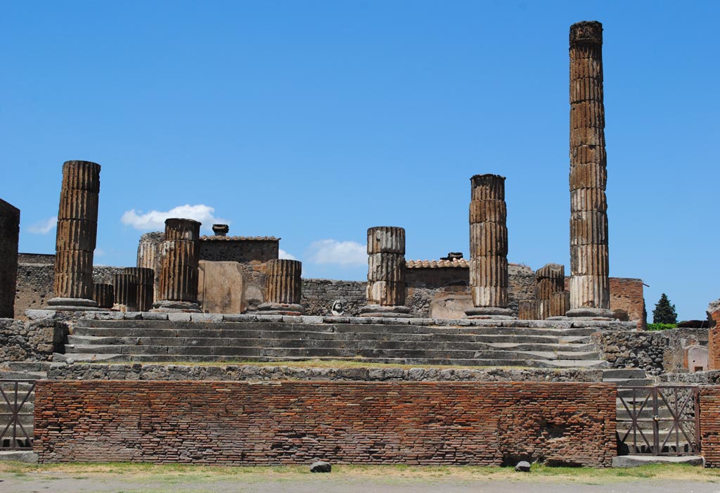 VII.8.1 Pompeii. July 2012. Looking north towards the Temple of Jupiter, at north end of Forum.
Photo courtesy of John Vanko. His father took the identical photo in February 1952, see below.
