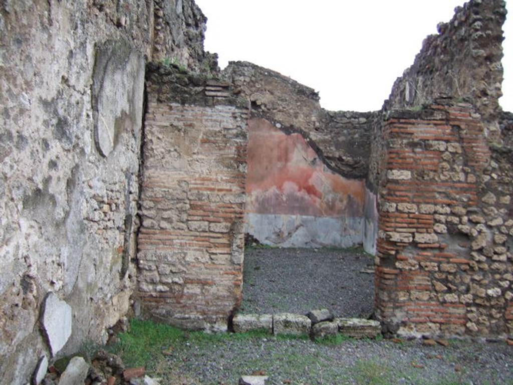 VII.9.38 Pompeii. December 2005. Looking towards doorway to triclinium, in north-west corner of atrium.  According to Helbig, a painting of Danae was found in the triclinium.
See Helbig, W., 1868. Wandgem�lde der vom Vesuv versch�tteten St�dte Campaniens. Leipzig: Breitkopf und H�rtel. (120)
