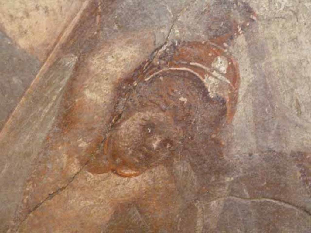 VII.9.47 Pompeii. Room 6, west wall of tablinum. Detail showing one of the cupids playing with the helmet of Mars. Now in Naples Archaeological Museum. Inventory number: 9248.