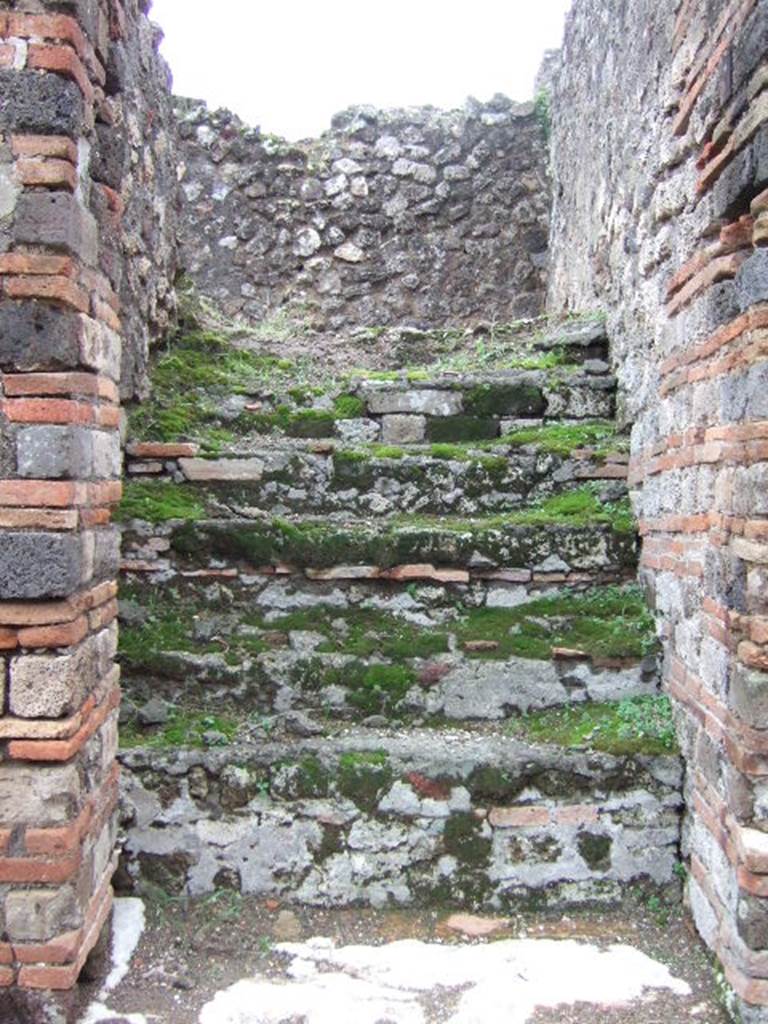 VII.10.1 Pompeii. December 2005. Looking east towards steps to upper floor.