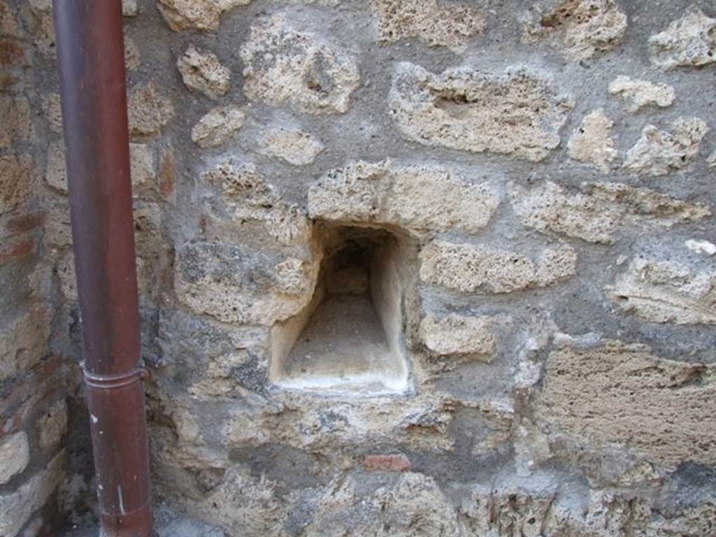 VII.10.14 Pompeii. December 2007. Tapered recess in wall to north of entrance.