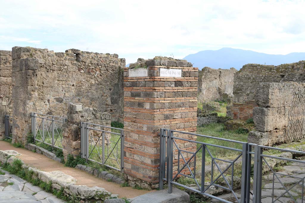 VII.12.1 Pompeii in centre, VII.12.2 on left. December 2018. 
The doorway at VII.12.37 is on the right. Photo courtesy of Aude Durand.

