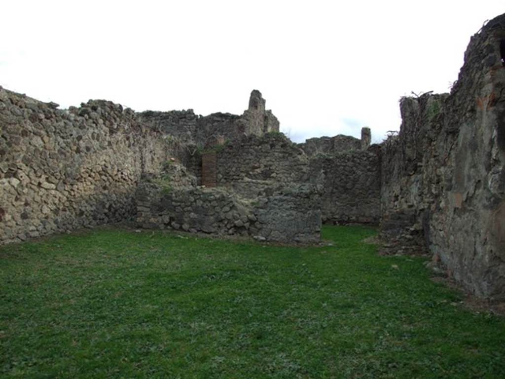 VII.12.5 Pompeii.  December 2007.  South wall with doorway to rear room.