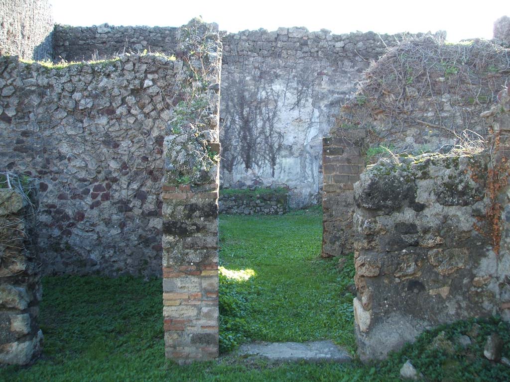 VII.12.7 Pompeii. December 2004. Corridor leading south to rear.