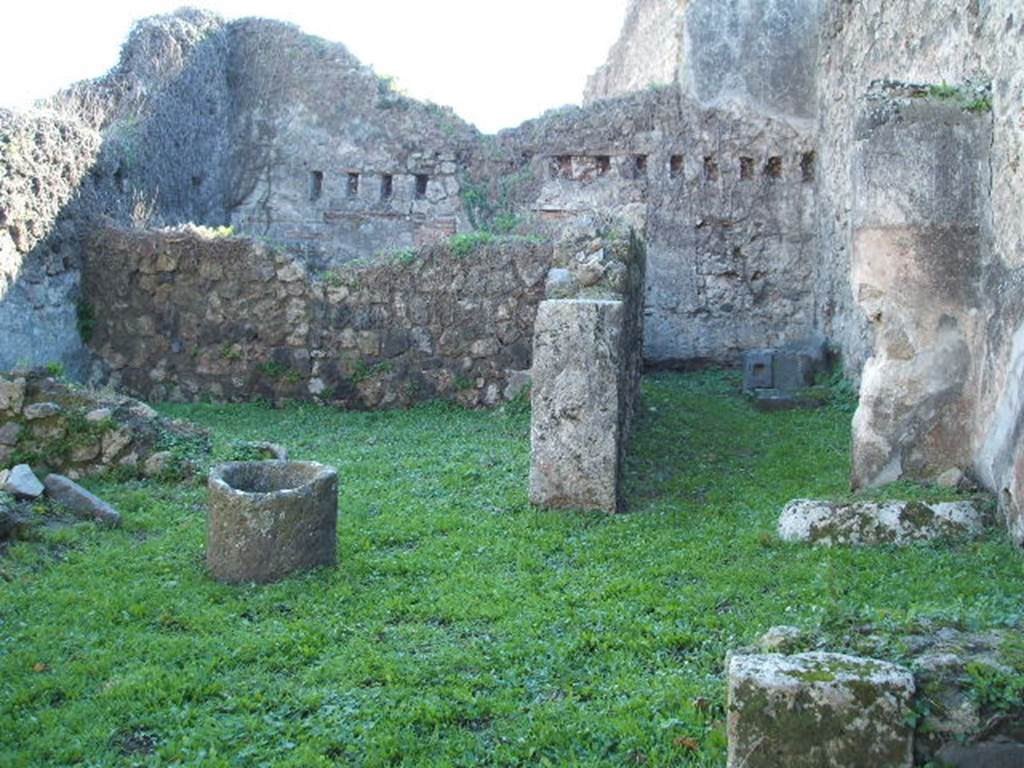 VII.12.11 Pompeii. December 2004. Looking south to doorway to rear room and corridor.