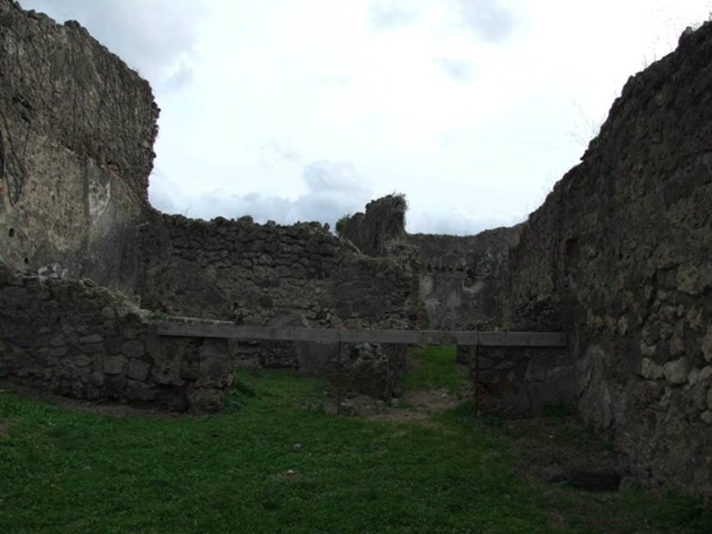 VII.12.13 Pompeii.   December 2007.  Looking south to rear room on left, and corridor to bakery area on right.